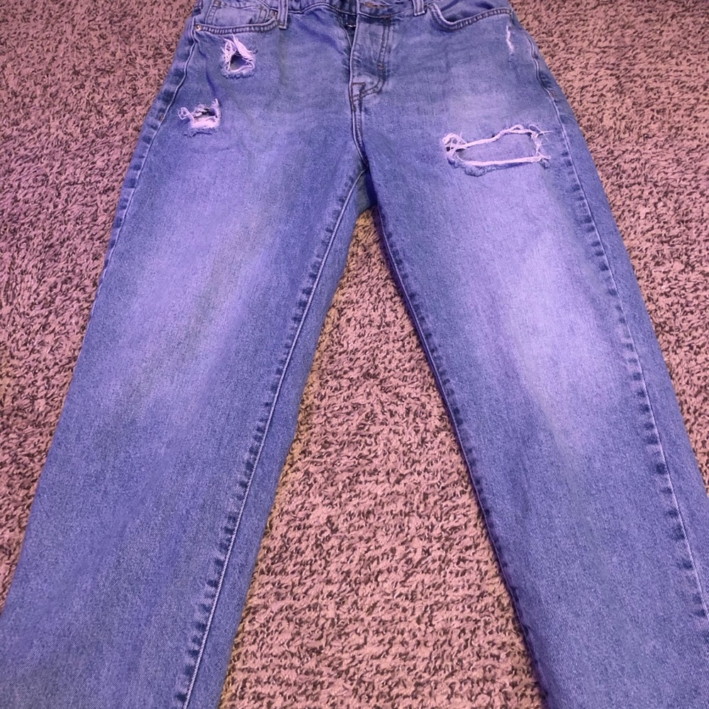 slightly ripped boyfriend jeans